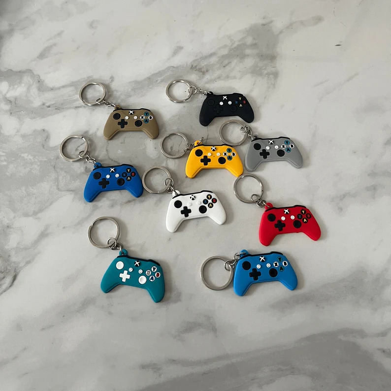 A promotional image of the Xbox controller keyrings from AandADorset on Etsy.