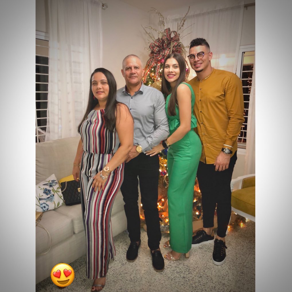 Willy Adames with his sister, father, and mother