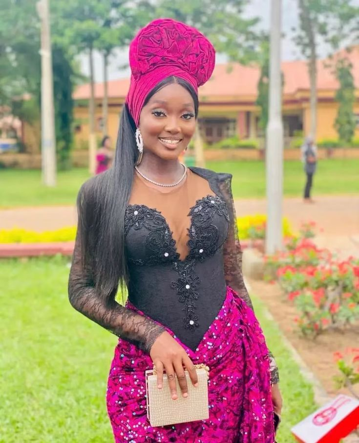 Beautiful picture of a lad looking good in her gele