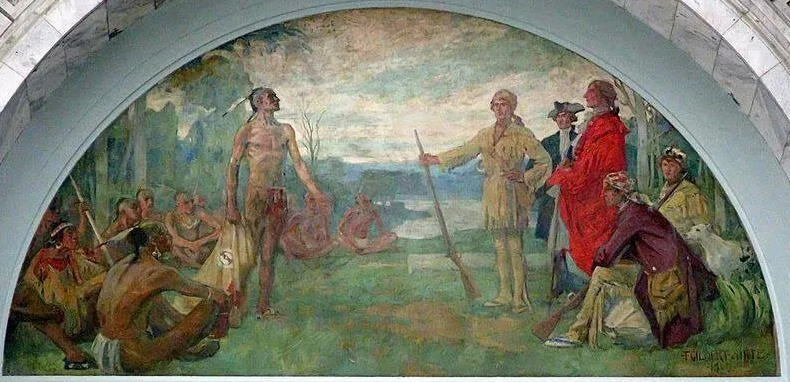 Two groups of people gather on a river bank. One group of American Indian people are wearing hair ornaments and deerskin clothing. The people among the group of white settlers are wearing colonial garb. The two central characters are likely Dragging Canoe and Daniel Boone.
