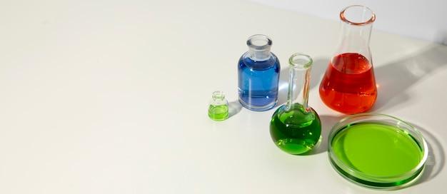 Free photo horizontal science banner with glass containers