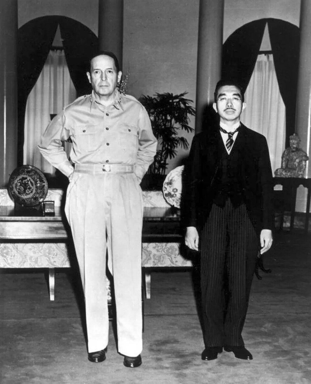 Emperor Hirohito and General MacArthur, at their first meeting