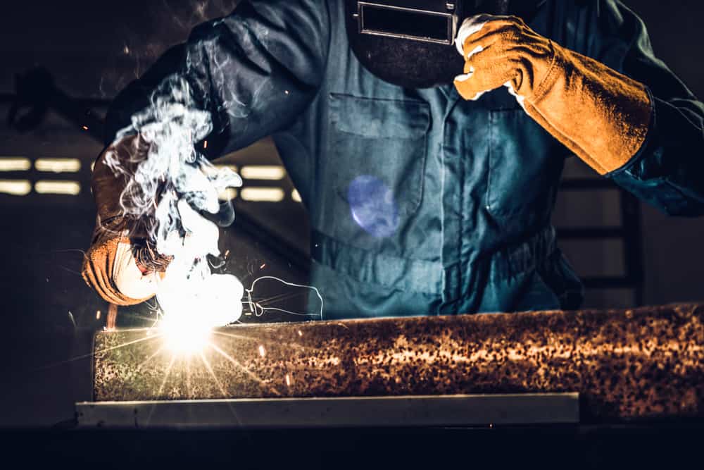 Fabricator doing CNC Laser Cutting