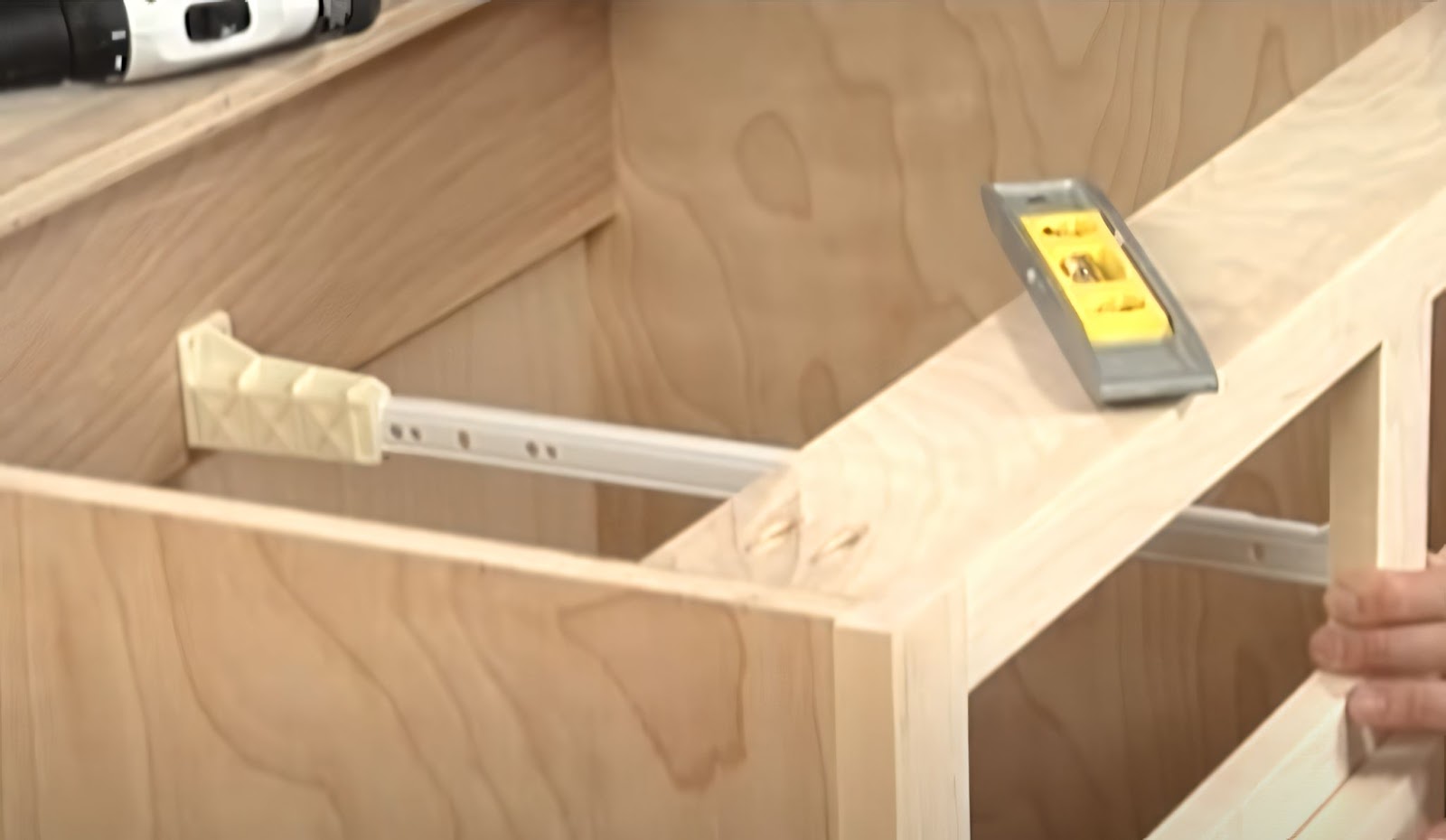 mounting drawer glides to cabinet