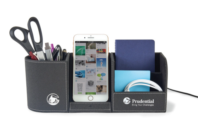 Screenshot of a desk organizer with office supplies and a phone. 