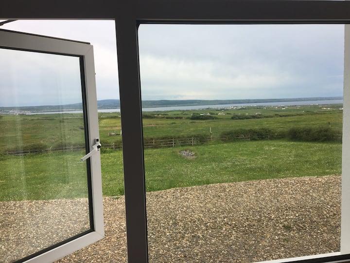 View from bedroom overlooking Liscannor Bay and where Atlantic meets Lahinch 