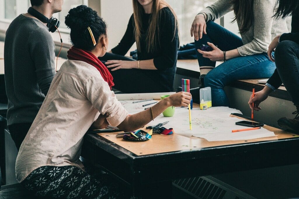 A group of people sharing feedback.