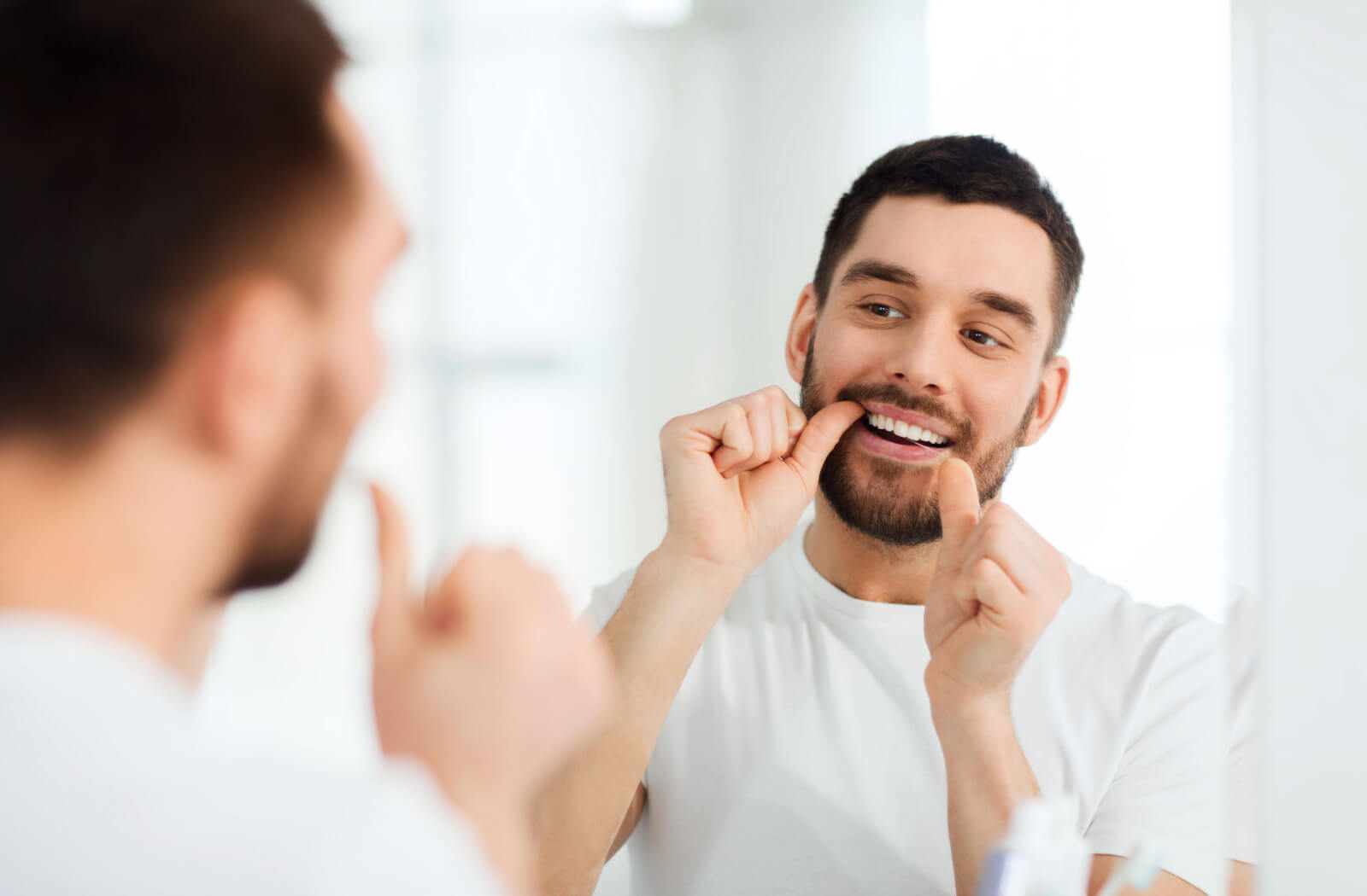 A man flossing.