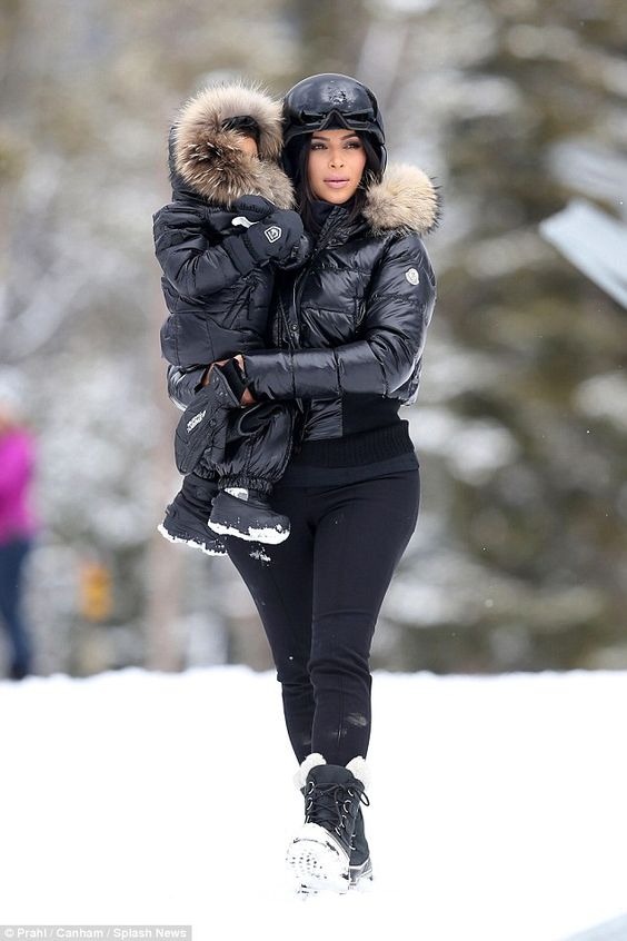 Picture of Kim Kardashian and North West wearing the moose knuckles coat