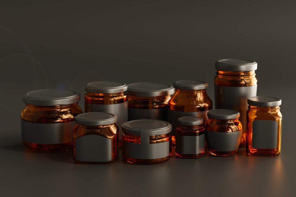 a group of jars with lids on a table