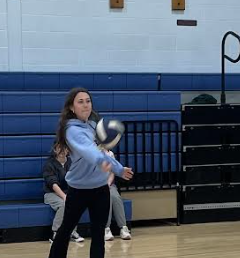 image of students playing volleyball