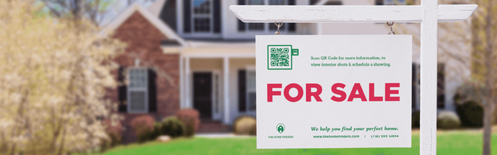 A 'For Sale' sign with a QR Code on it