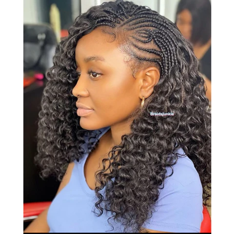 Picture showing a lady rocking Side Cornrows and Wavy Crochet 