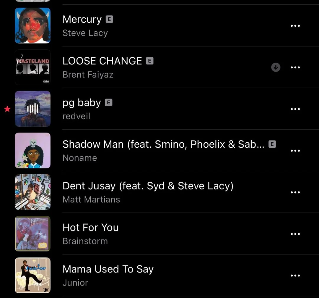 Apple Music playlist screenshot, one of the songs has a red star icon near a small album art