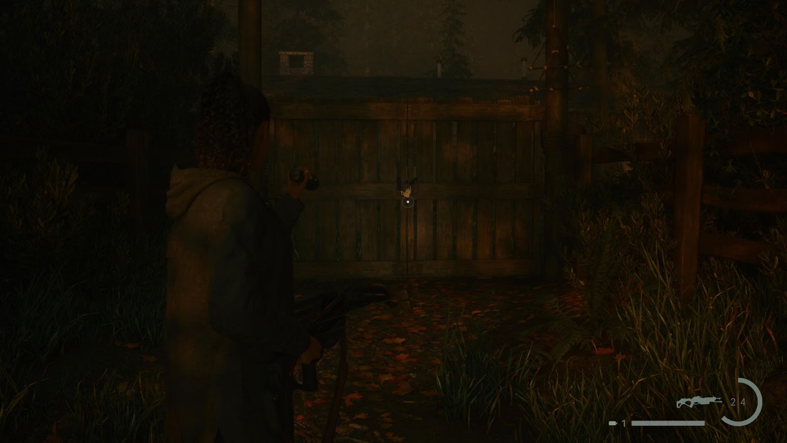 An in game screenshot of the locked gate to the rental cabins area in Cauldron Lake from Alan Wake 2