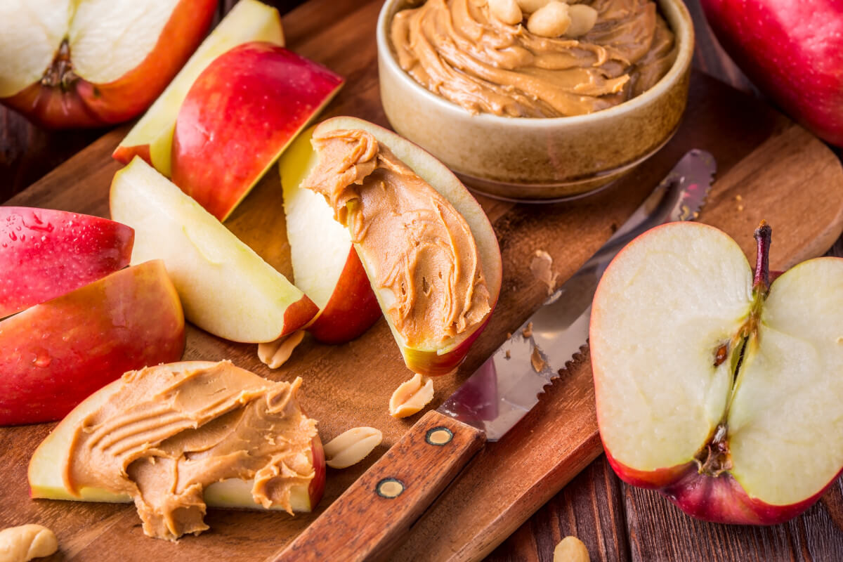 red apples with peanut butter snack