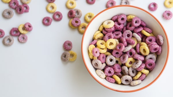 A bowl of colorful doughnut-shaped cereal