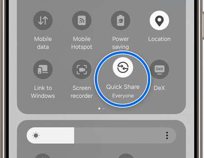 Quick Share icon highlighted in the Quick Settings panel
