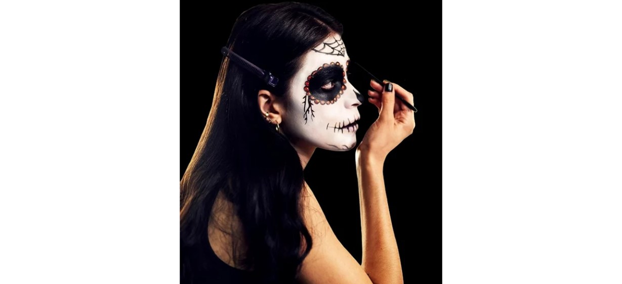 Person applying Halloween makeup