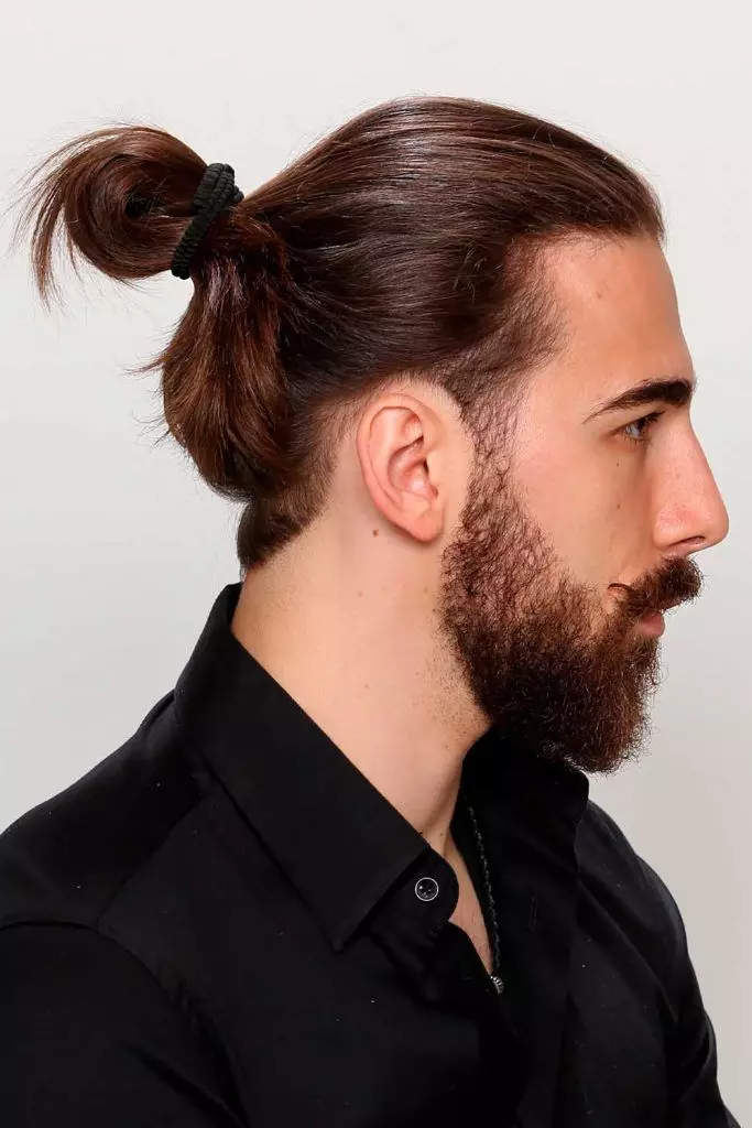 Side view  of  a man bun  a perfect semblance of the viking hairstyles 