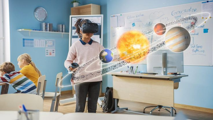 A child wearing a virtual reality headset interacting with the solar system. 