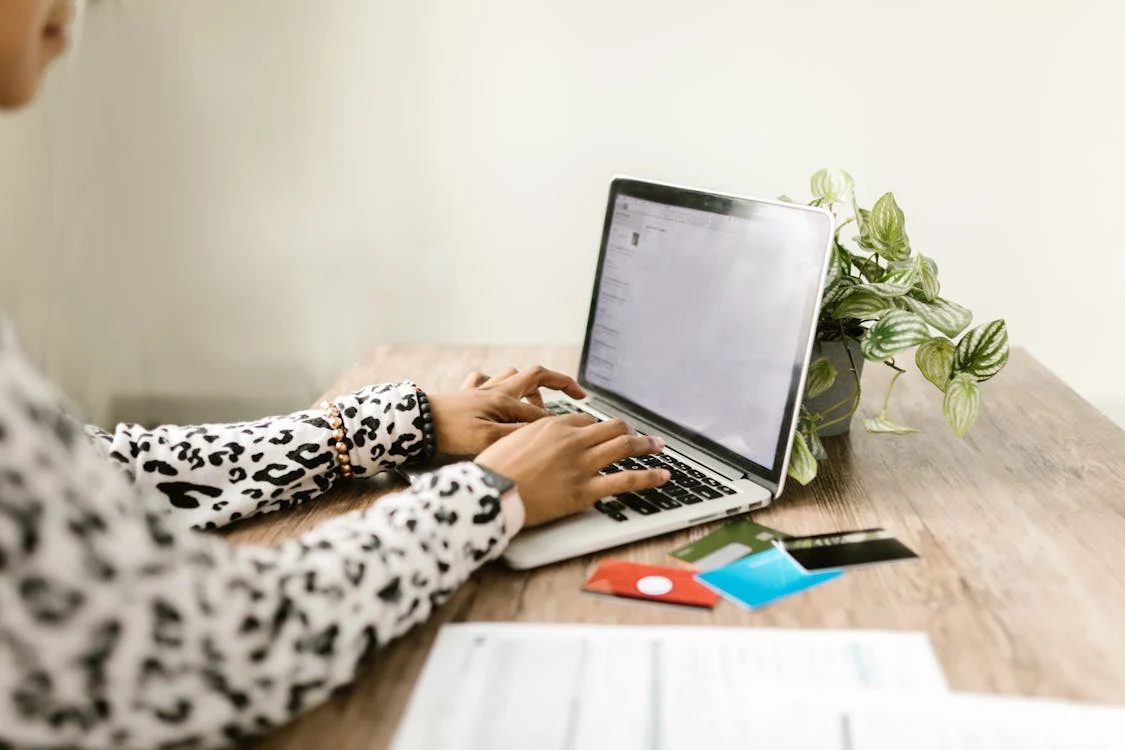 close up shot of a person using laptop