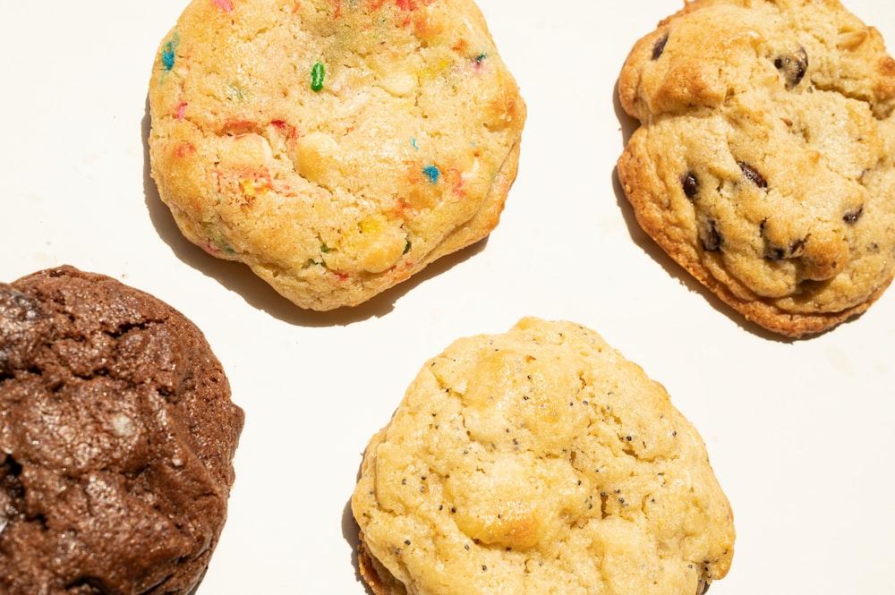 a close up of four cookies on a table