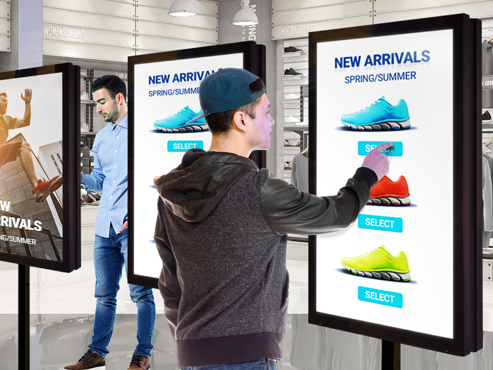 Interactive Digital signage networks in Clothing Stores. Image Source: LG Electronics.  AI Digital Signage - REV Interactive