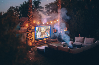 ways to make your outdoor living space your own home theater with screen projector couch and fire pit custom built michigan