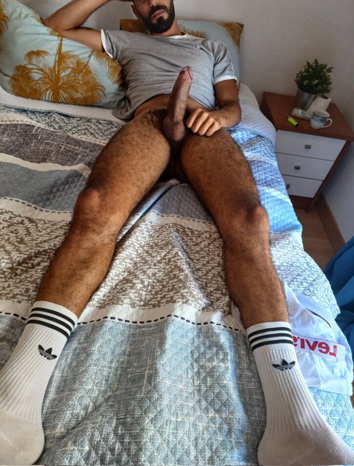 karim yoav posing naked on the bed with no pants showing off his hard cut cock
