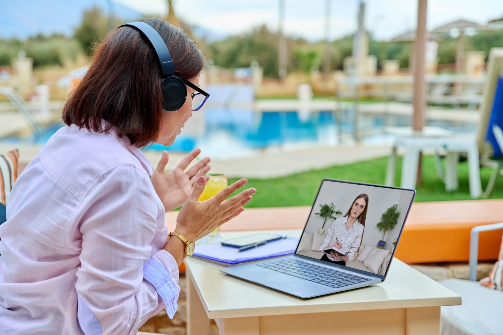 Two women on zoom meeting during remote work talking about upgrading infrastructure