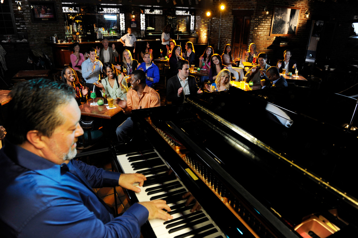 A man playing piano at Pat O'Brien's