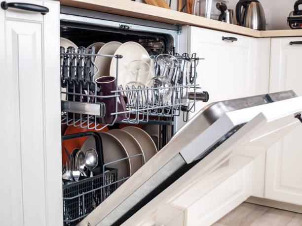 Dishwasher Closeup With Washed Dishes Easy To Use And Save Water  Ecofriendly Builtin Kitchen Dish Washing Machine Stock Photo - Download  Image Now