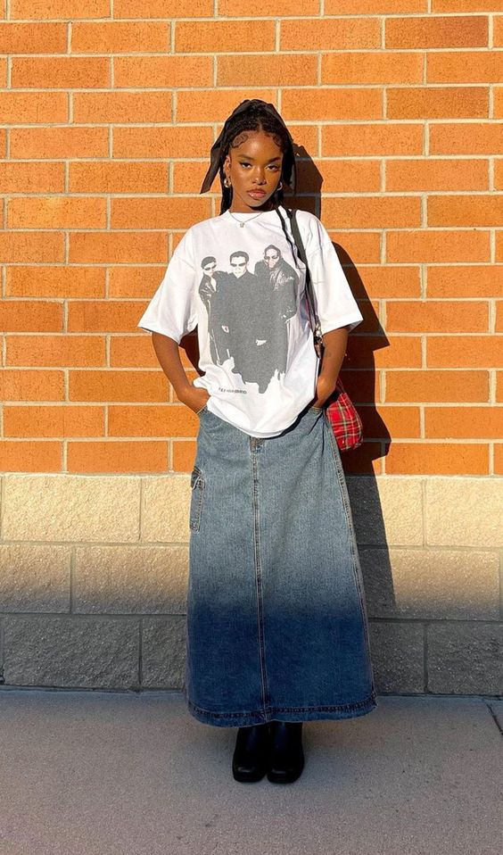 Picture showing a lady rocking the denim skirt skirt in style