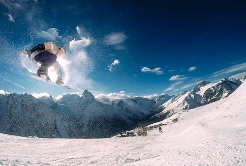 Free Man Snowboarding  Stock Photo