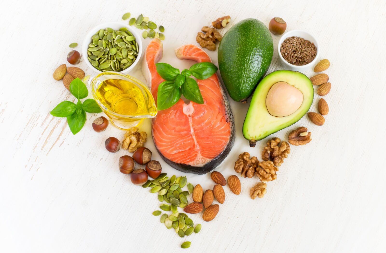 An assortment of foods rich in Omega-3 arranged in the shape of a heart.