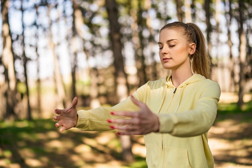 Qigong breathing exercises foster energy flow and tranquility through mindful breathing.