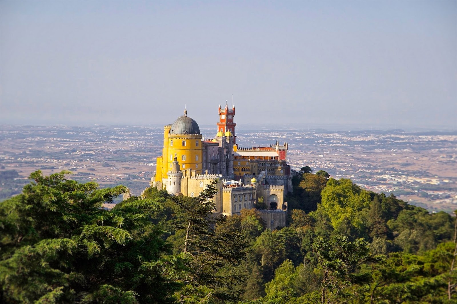 A fairytale of vibrant colors and architectural marvels atop Sintra's hills.
