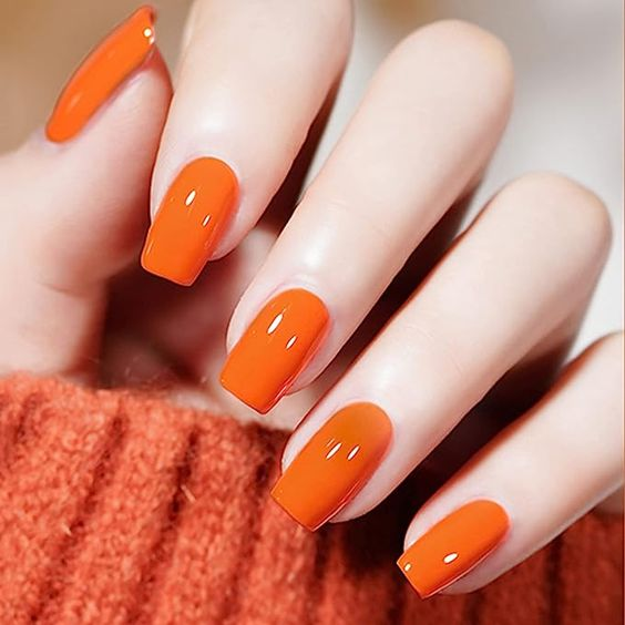 Full view of an orange summer Nail Color