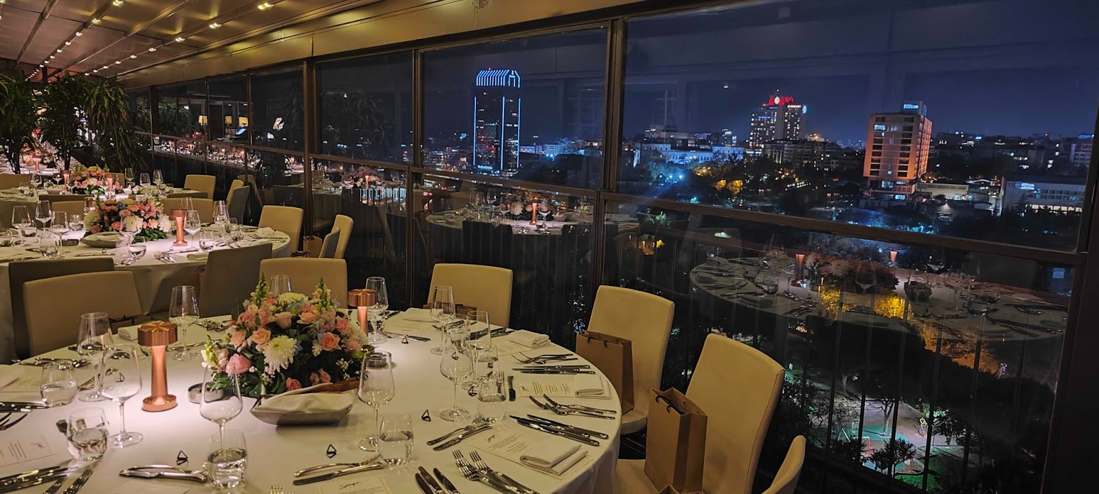 Dinner tables at Spago restaurant with a panoramic view of Istanbul, Turkey