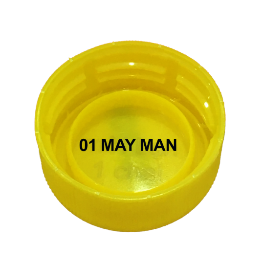 A yellow plastic bottle cap with black text

	Description automatically generated