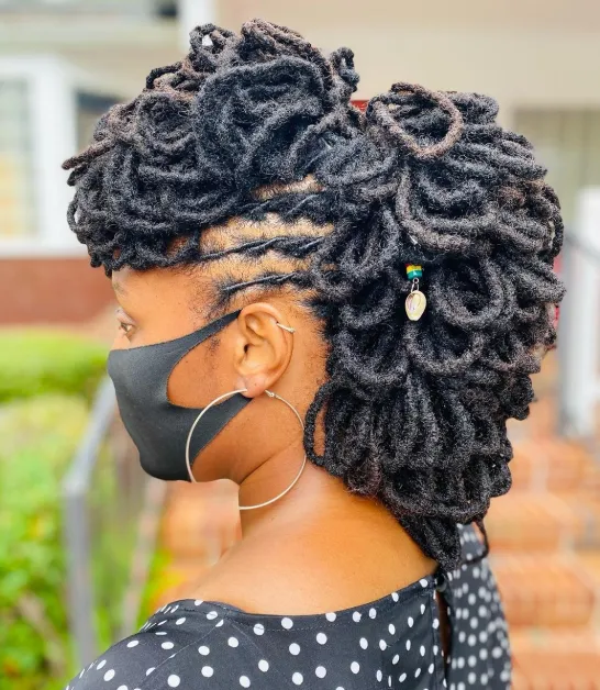 lady wearing mohawk with dreadlocks