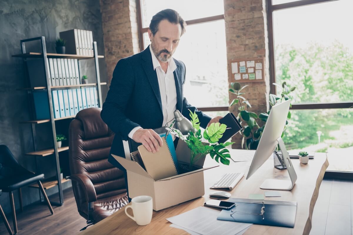 Return to work plan: manager putting his stuff in a box