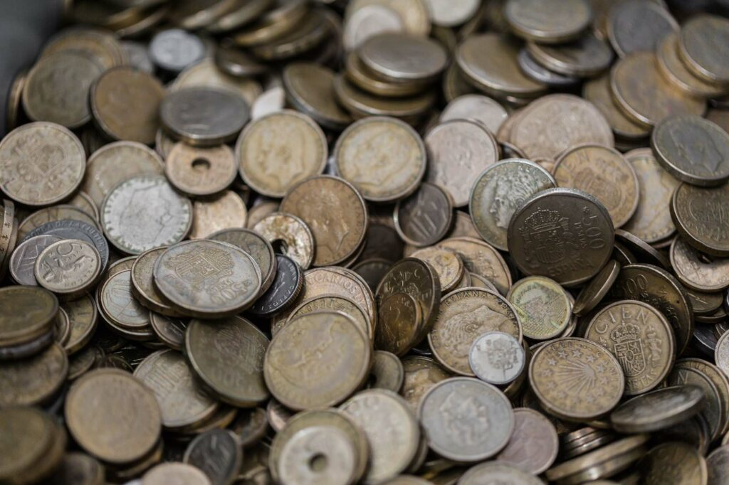 Pile of foreign coins

Can you exchange damaged foreign banknotes and coins