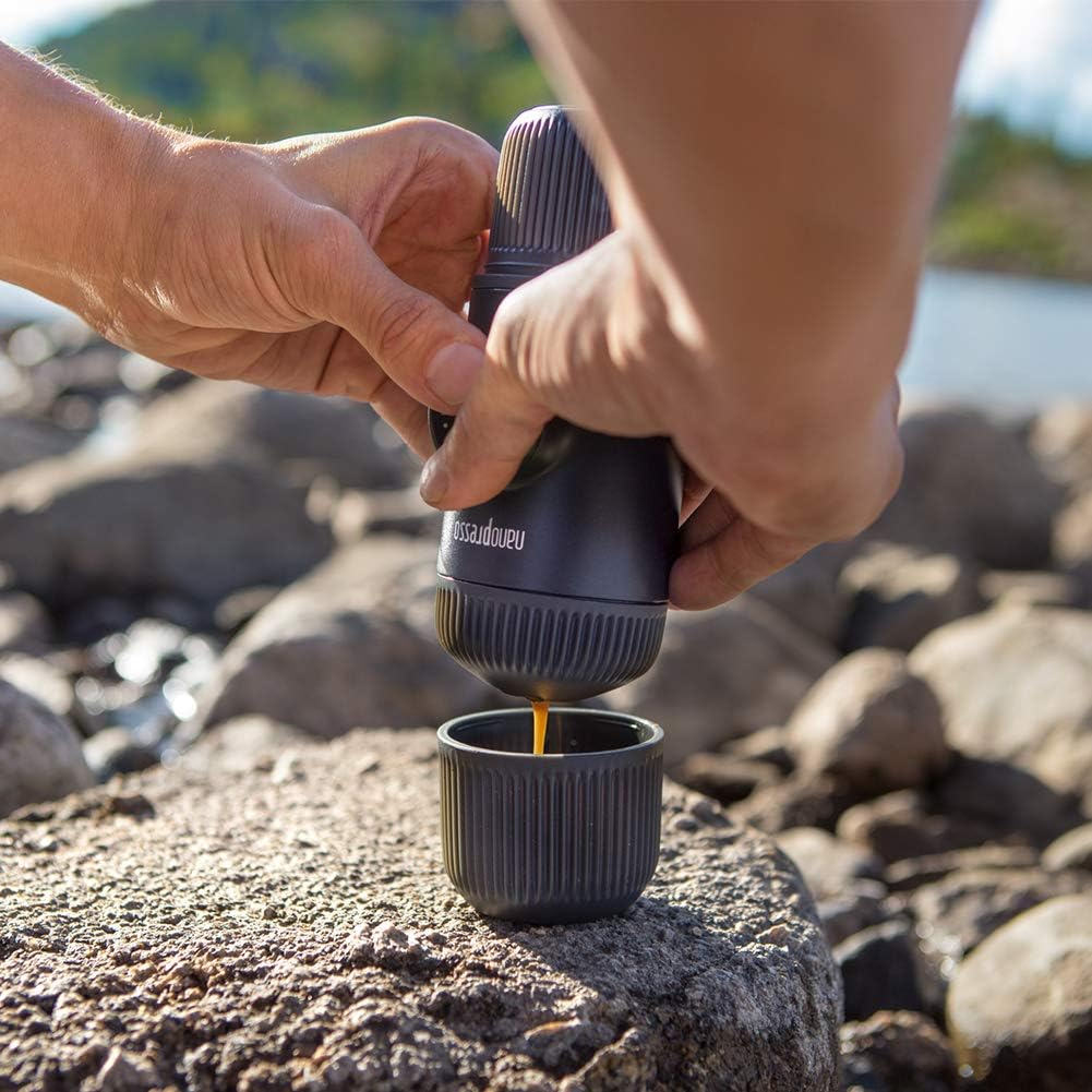 hand powered portable espresso maker while camping