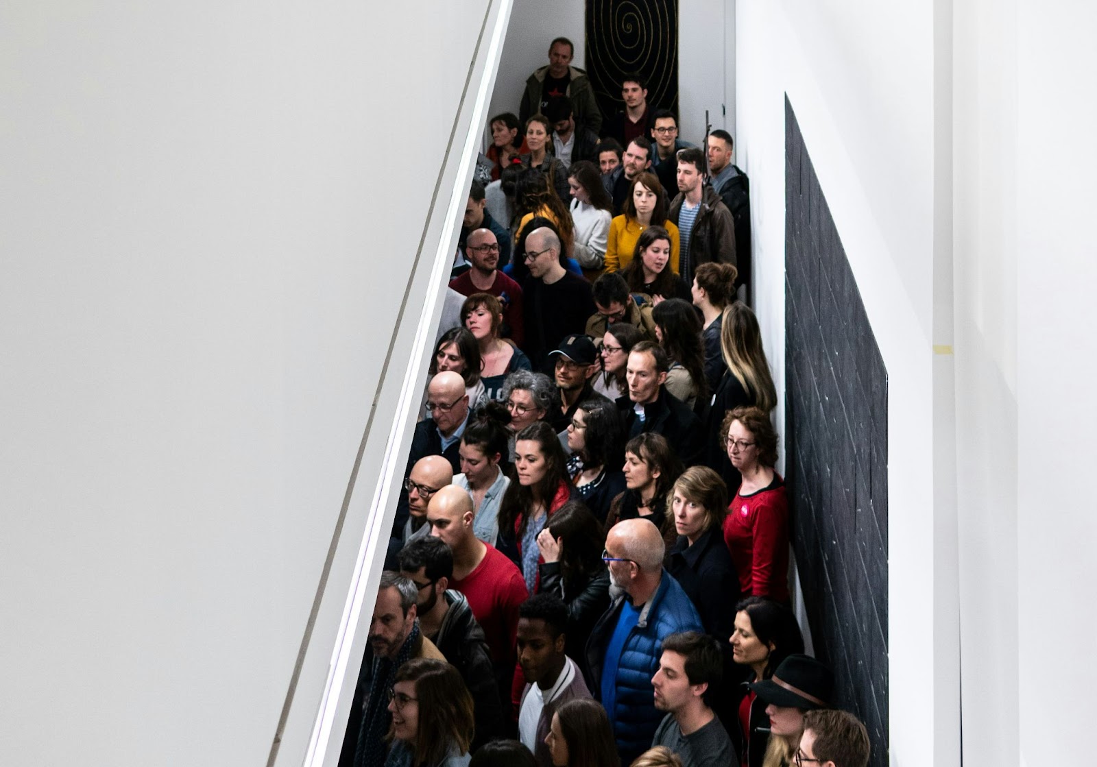 Considering the road not taken: Looking down on a crowd ov visitors at the Musée des Beaux-Arts, Angers, France.