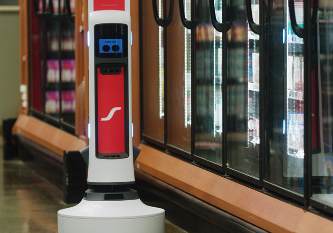 Tally is a tall, narrow robot on wheels, with a front-facing screen showing cartoony eyes