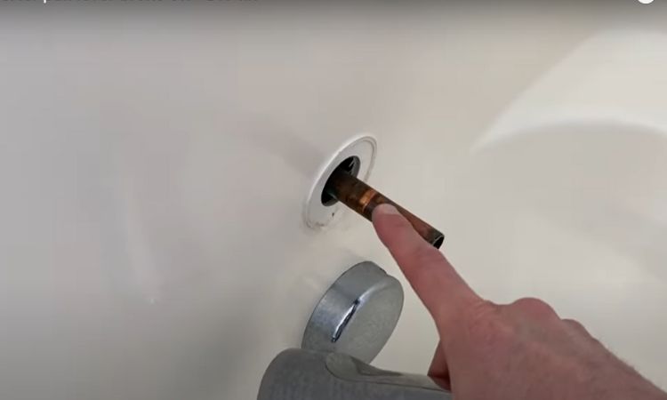 cleaning the tub spout