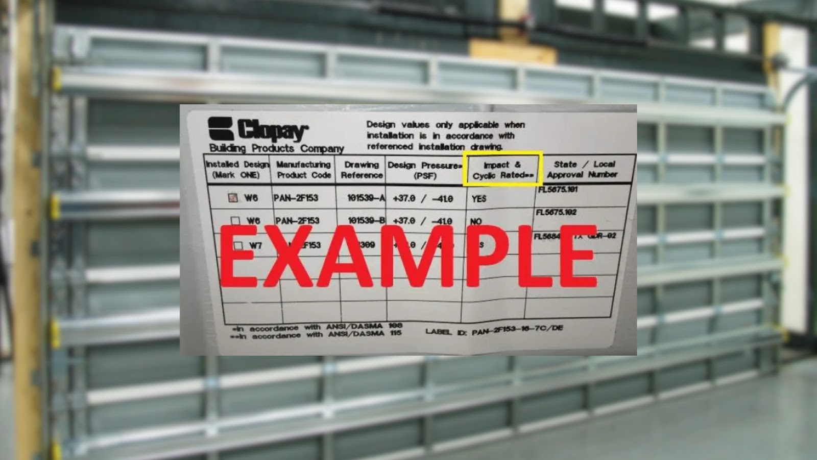 A sticker indicating the garage door is impact-rated