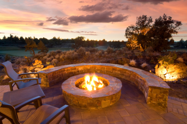 ways to make your outdoor living space your own fire pit with stone seating area custom built michigan